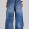 Nailed Studded Colossus Jeans in Mid Blue Wash