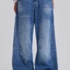 Nailed Studded Colossus Jeans in Mid Blue Wash