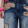 Tattered Colossus Jeans