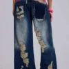 Tattered Colossus Jeans