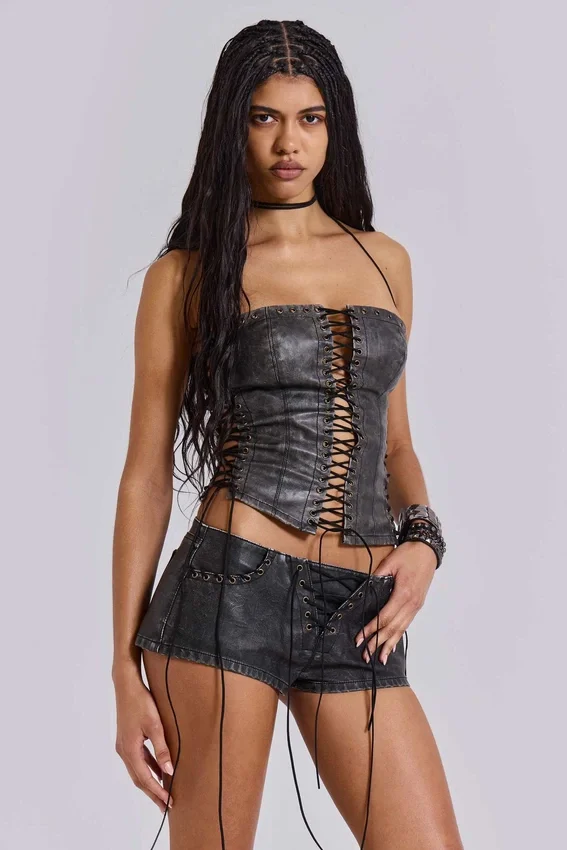 Vaca Whipstitch Faux Leather Mini Shorts in Black