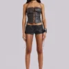 Vaca Whipstitch Faux Leather Mini Shorts in Black
