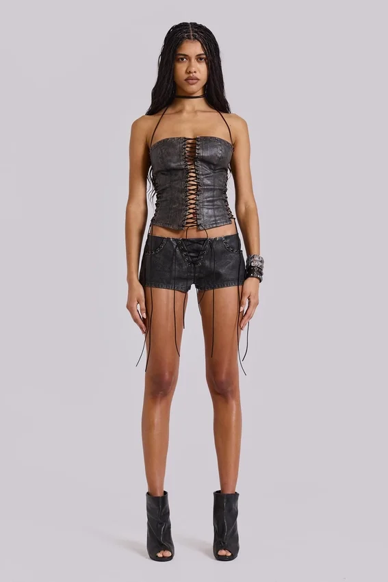 Vaca Whipstitch Faux Leather Mini Shorts in Black