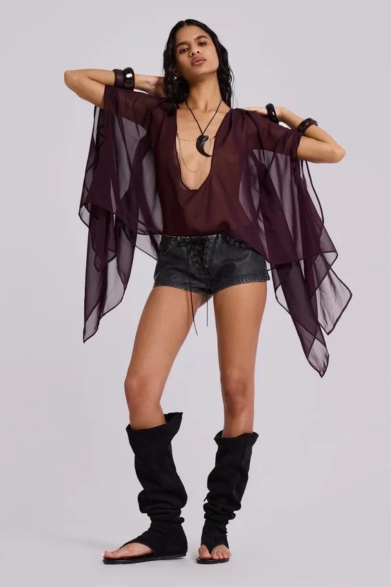 Vaca Whipstitch Faux Leather Mini Shorts in Black