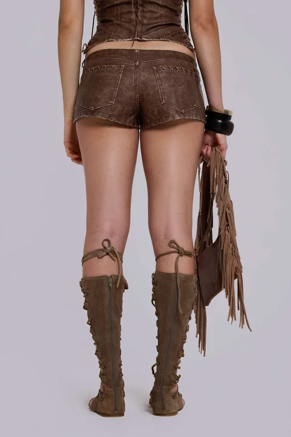 Vaca Whipstitch Faux Leather Mini Shorts in Brown